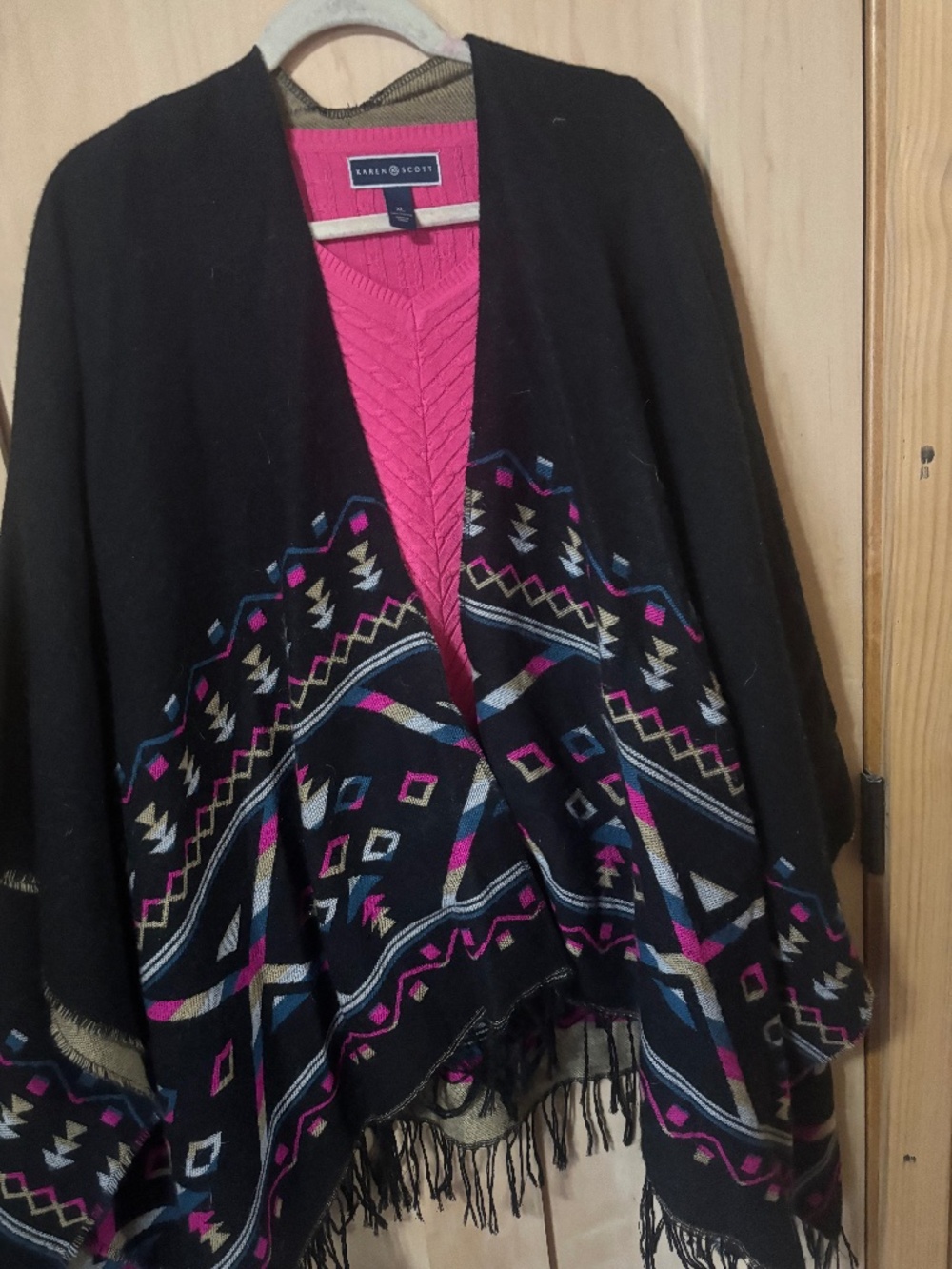 Poncho and sweater